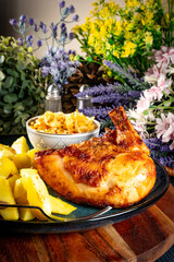 A delicious piece of roasted chicken.