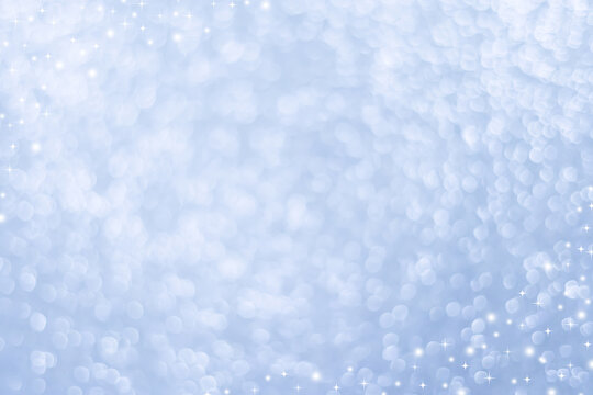 abstract blur blue and silver color background with star glittering light for show,promote and advertise product and content in merry christmas and happy new year season collection concept