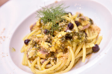 Pasta con le sarde e finocchietto or Bucatini with sardines and fennel is a typical dish of...