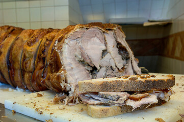 Porchetta d iAriccia  is typical food of Rome area and is a succulent, boneless Italian pork roast.
