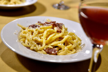 Tonnarelli alla gricia is a tipical egg pasta whit bacon and pepper made In Rome Lazio Italy