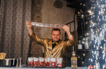 Bartender showcasing cocktail flair in a dazzling show