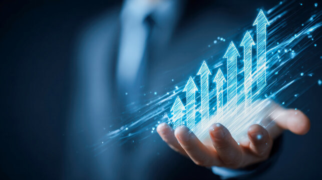 Businessman holding glowing digital arrows rising upward symbolizing growth success and progress in technology and financial advancement in future trends