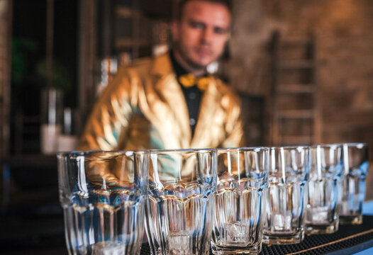 Bartender starts crafting exquisite cocktail beverages