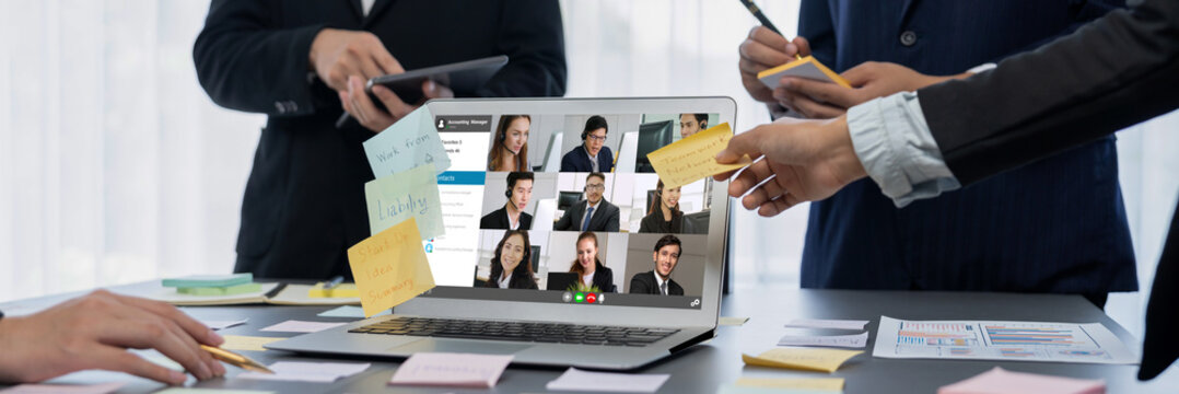 Business people on video conference for brisk virtual group meeting of corprate business office workers