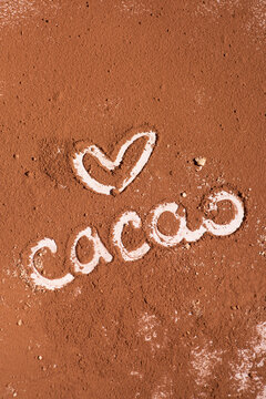 Cacao powder background with heart pattern