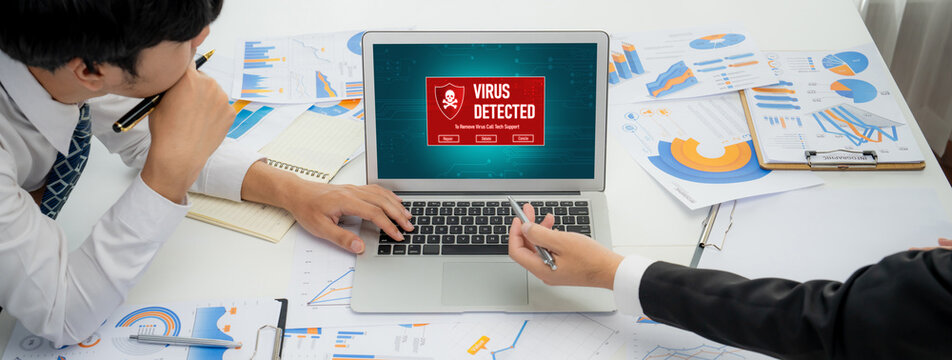 Virus warning alert on computer screen detected brisk cyber threat , hacker, computer virus and malware