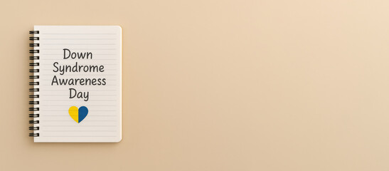 Down Syndrome Awareness Day concept with notebook on beige background