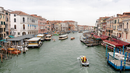 View of Rialto Bridge and bustling Grand Canal traffic