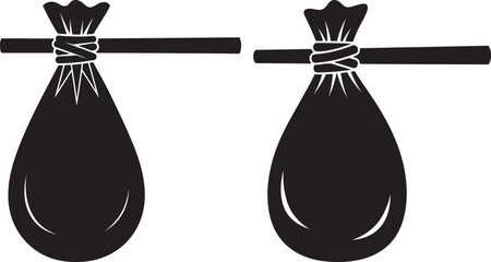 Two black silhouette bags hanging on a wooden stick