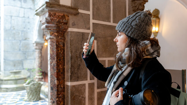 Woman capturing moments at Pena Palace in Sintra