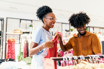 Couple shopping together in clothing store