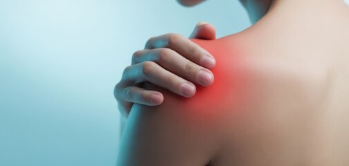 The Shoulder Showing Red Inflammation and Pain While Being Gently Held