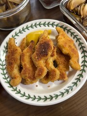 Korean Chicken Nuggets Served with Mustard Sauce on a Plate