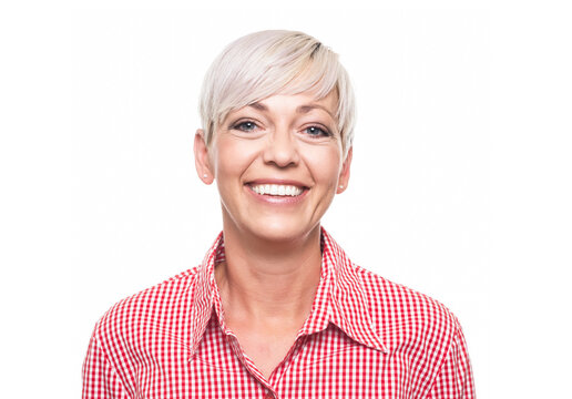 Teeth smiling face of beautiful adult woman. Close-up cheerful middle aged woman with toothy smile expression, isolated on white background.