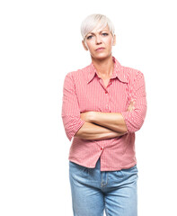 Portrait of serious adult woman, strict middle aged woman with hands on waist looking to camera, isolated on white background.
