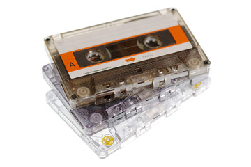 Obraz premium Stack of retro audio cassettes isolated on white background