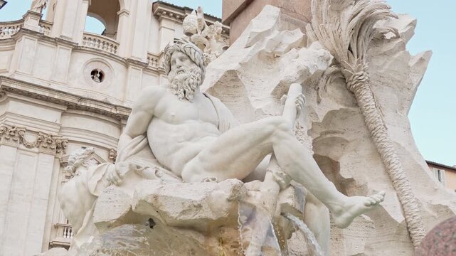 Statue of River God at the Fountain of the Four Rivers on Piazza Navona