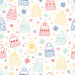 Colourful seamless pattern with winter hats in cartoon style. Vector illustration