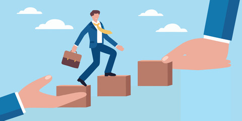 Businessman climbing stairs with help from supportive hands