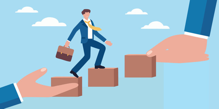 Businessman climbing stairs with help from supportive hands