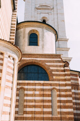 Architectural detail of the Verona Cathedral, showcasing its unique brickwork and design.