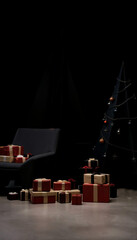 Stylish wrapped gifts around a modern Christmas tree in a dark setting