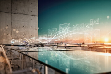 A modern office space with glass tables and a concrete wall, featuring holographic data displays and flowing light waves against a sunset backdrop.