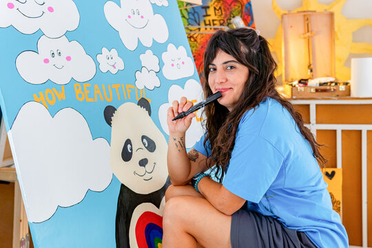 Visual artist immersed in creative process in workshop