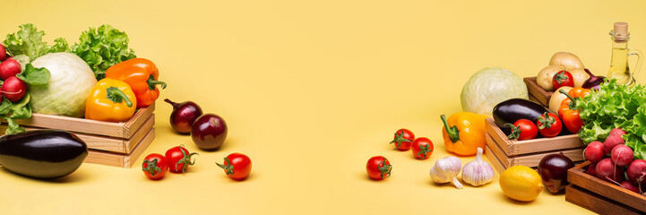 Healthy food. Set of vegetables. Tomatoes, eggplants, potatoes, onions, cabbage, radish salad, lemon on a yellow background. Horizontal photo.