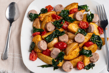 sauteed tomatoes and spinach  with chicken  sausage