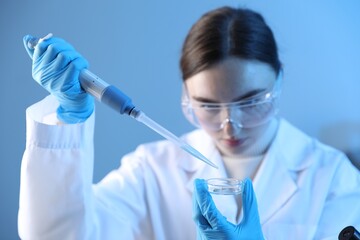Fototapeta premium GMO concept. Scientist working with sample of product in laboratory, selective focus