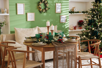 Festive table setting with Christmas decor indoors