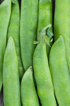 Close-up of fresh green peas in pods