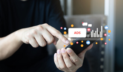 businessman hand touch screen on digital tablet to use marketing tool to announce promotion and special offer and checking traffic research of pay per click program on web page for online business