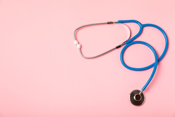 Fototapeta premium Stethoscope on the table. Medical instrument. Medical concept. Healthcare. Health Day.Doctor equipment. Cardiology. Heart disease.Lung diagnostics.Diagnosis of respiratory inflammation.Space for text