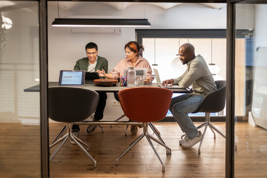 Collaborative teamwork in a modern coworking office setting