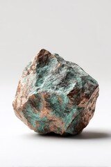 A detailed shot of a rugged, raw stone displays a fascinating interplay of natural textures and colors.