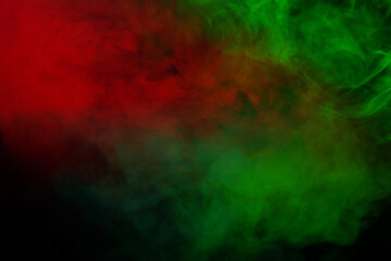 Blue and green steam on a black background.