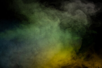 Green and white steam on a black background.