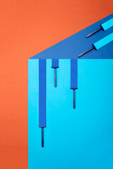 Geometric still life with five blue razors