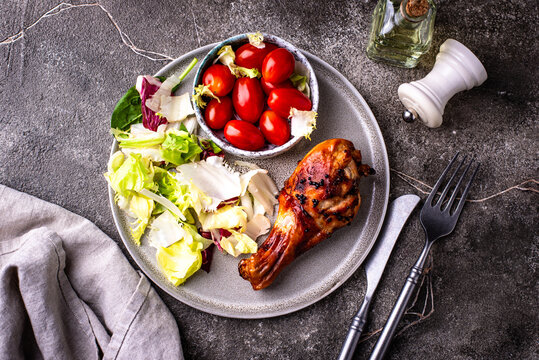 Roasted chicken drumsticks with vegetables