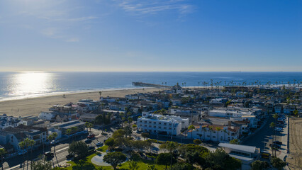 Aerial shot along the coastline at the Newport Beach Pier in Newport Beach California USA