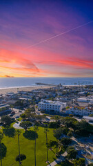 Fototapeta premium Aerial shot along the coastline at the Newport Beach Pier in Newport Beach California USA