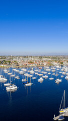 Aerial shot of boats and yachts in the Newport Bay in Newport Beach California USA