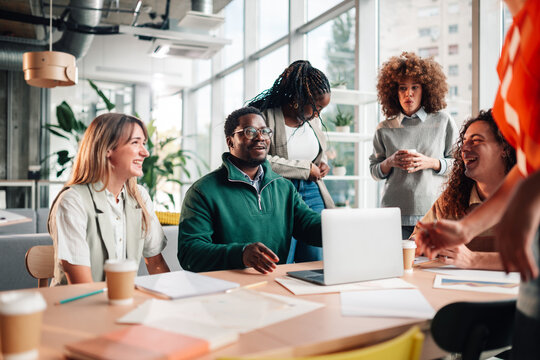 Diverse business team collaborating during office meeting