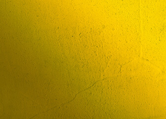 Abstract yellow gradient concrete wall background texture. Light ray color gradient shadow blurred. 