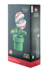 Naklejka premium Pack of a Lego construction created in collaboration with Nintendo, featuring a buildable Piranha Plant figure from Super Mario video game, isolated on transparent background