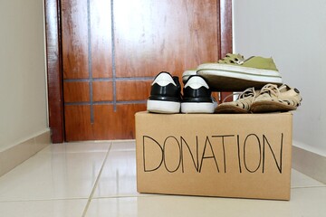 Cardboard box for donation. Charity concept. Donation box. 