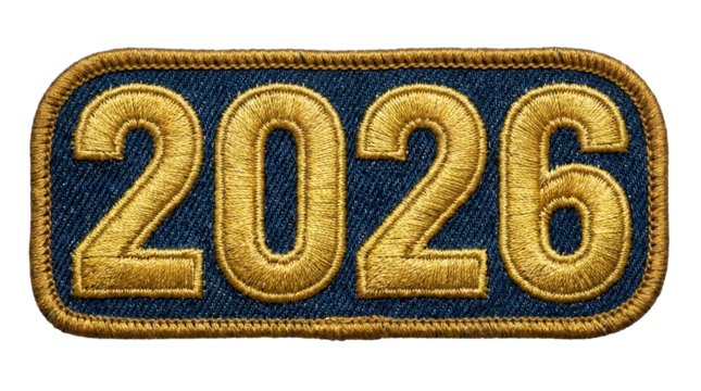 Embroidered patch of the year 2026 golden thread on denim isolated on white background